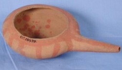 Dynasty 12, dish with long spout and red slip decoration UC18470 - Copyright of the Petrie Museum of Egyptian Archaeology, UCL